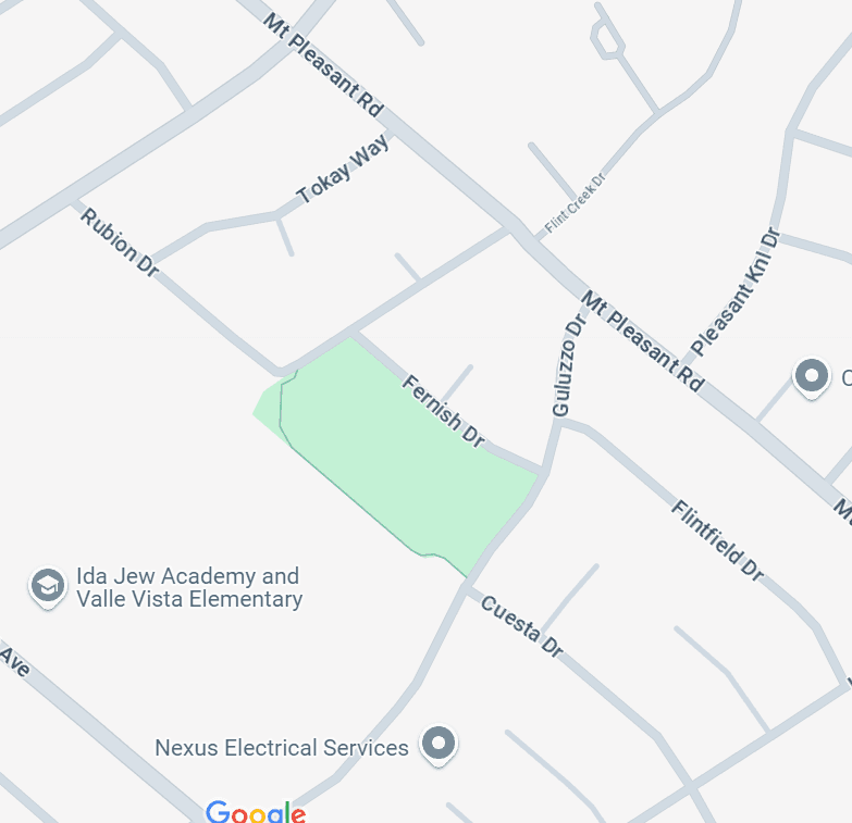 Map showing roads and green area near Ida Jew Academy and Valle Vista Elementary.